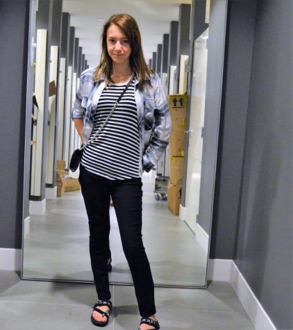 Photo by: Neko Collins Lauren Barina, 8th Grader at Stewarts Creek Middle School, wears a striped tank-top, a plaid jacket, skinny- cut jeans, and a chained black purse at Forever 21.