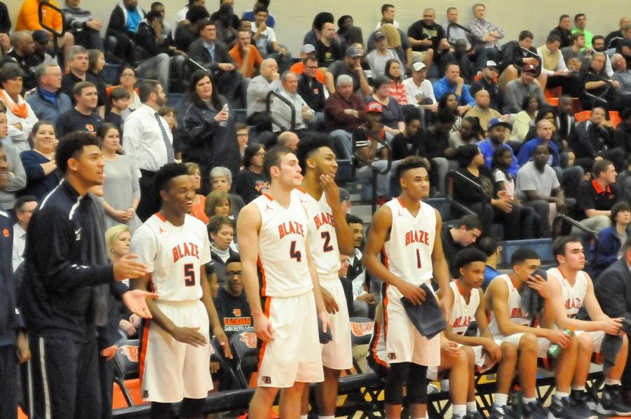 Photo courtesy of Kim Baumann

David Ivy, Jaellan White, Christian Dewitt, Jarrell Reeves, Donovan Sims, Trent Gibson, and Miller Armstrong cheer on the team in the closing seconds of the substate win vs. Bradley Central
