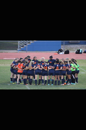 The Lady Blaze huddle up before their game against Lavergne 