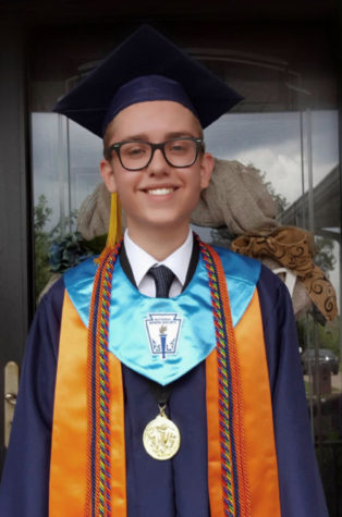 Zach Adams, Blackman 2017 alumnus, smiles bright in full graduate gear.