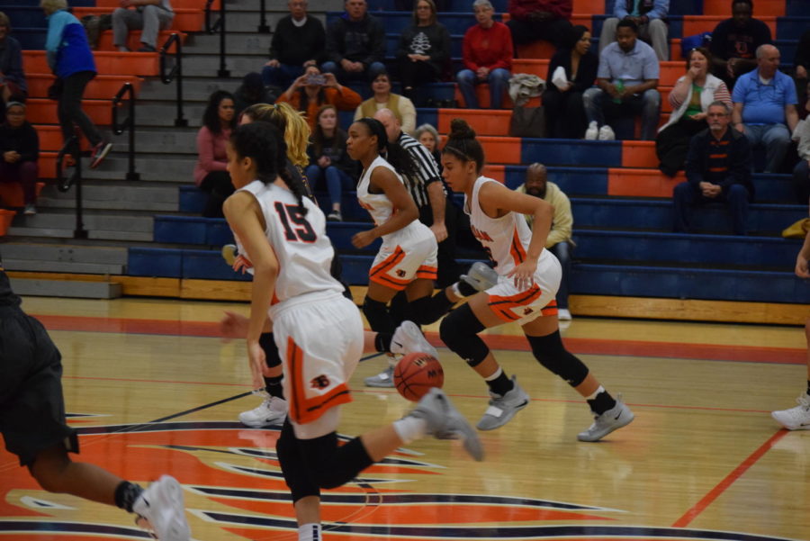 The Lady Blaze charge down the court as a team! 