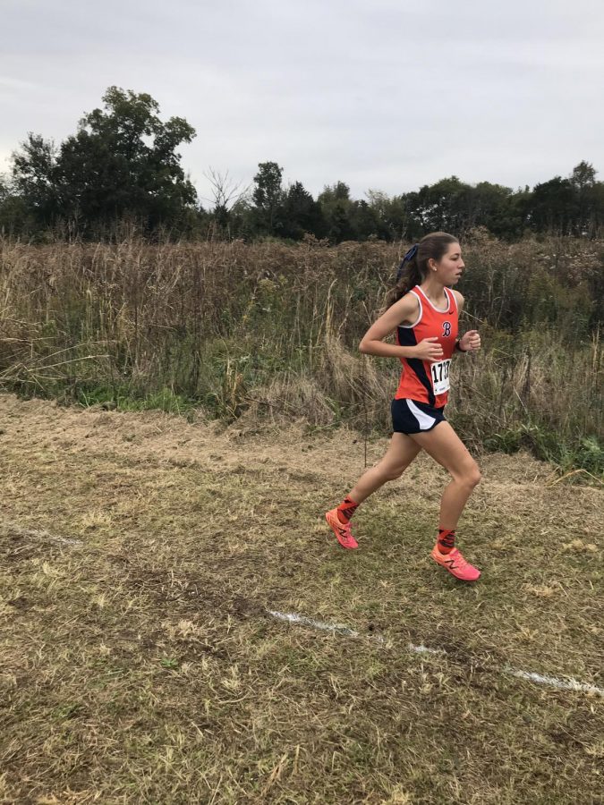 Megan Roth, senior, running in Cookeville. 