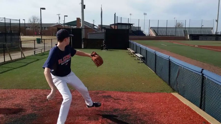 Lucas Smith, sophomore, playing baseball.