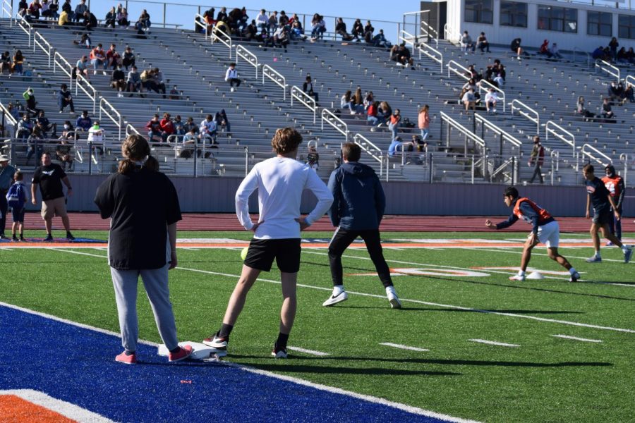 Students play or watch kickball at the Inferno.