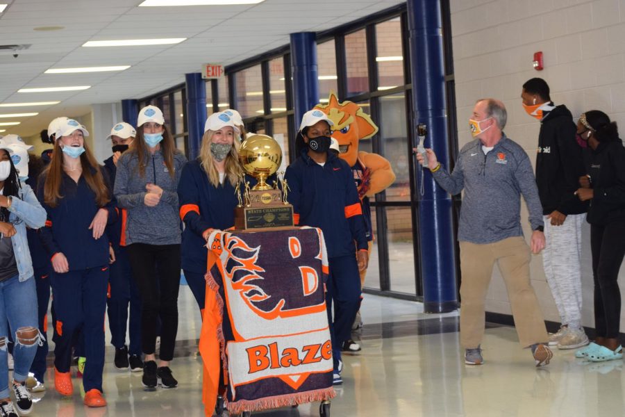 The Lady Blaze celebrated their state championship with a hall parade on Thursday. 