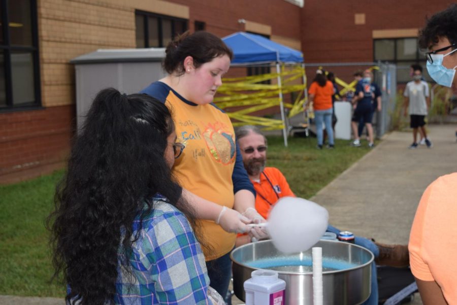 Abby Ledbetter and the Criminal Justice Club sell Cotton Candy at the Blaze Bash.