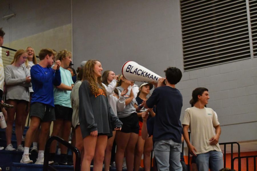 The Student Section keeps spirits high at the last Volleyball game of the season.