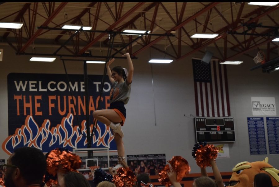 The Blaze Cheer team welcomes students into the Furnace.