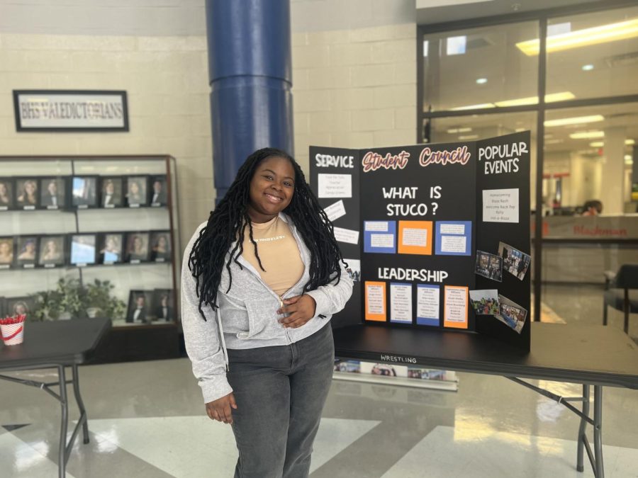 Kiyah Cemone with the Student Council booth