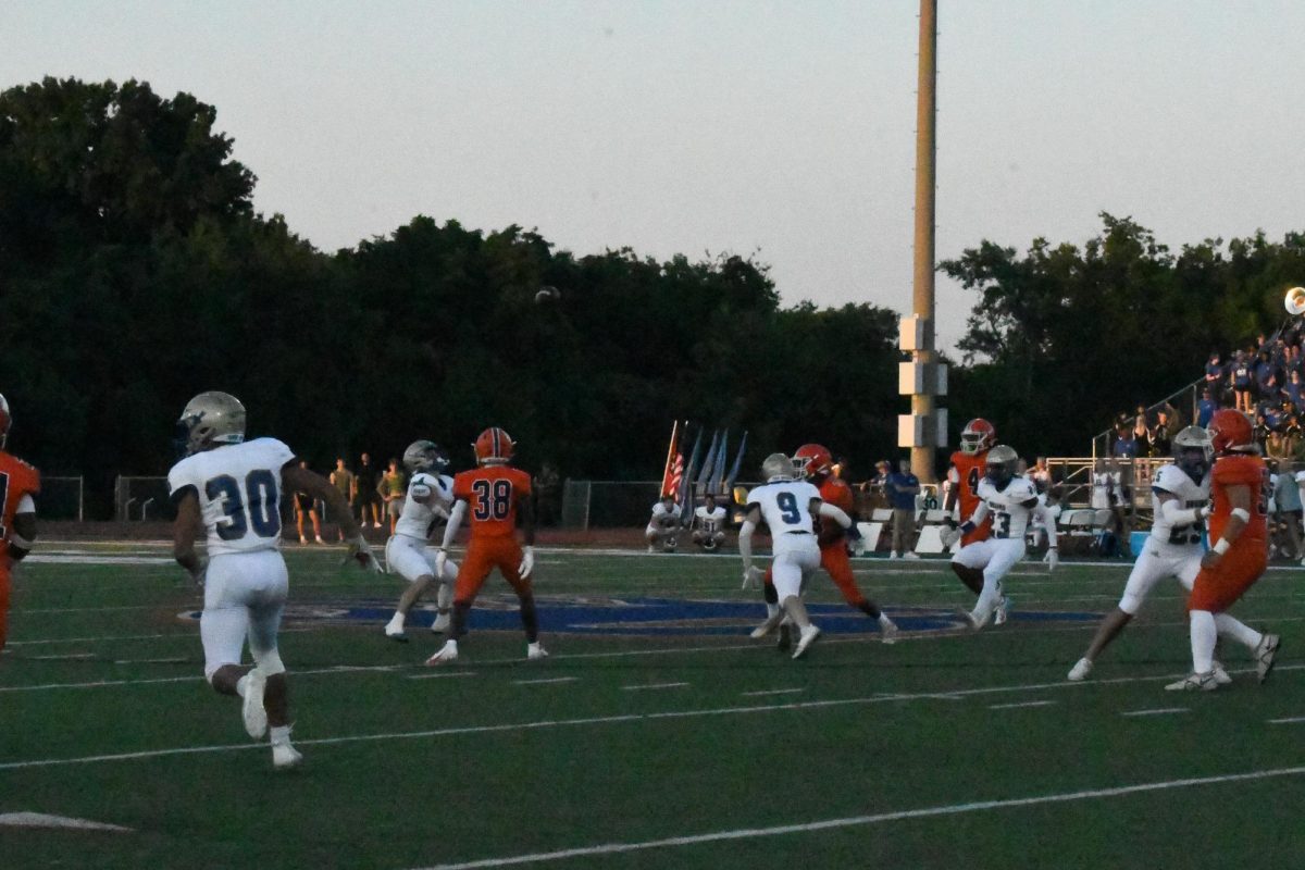 Blackman punting the ball to Brentwood