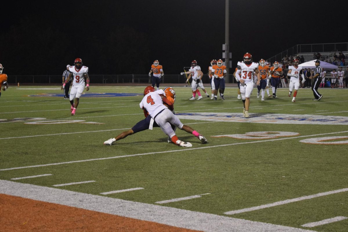Coffee County player tackles Blackman player