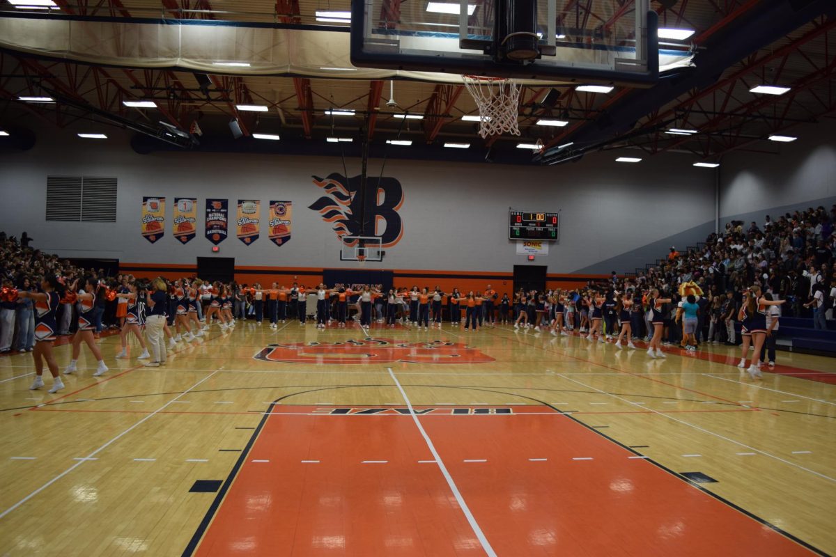 Cheer and Dance team welcoming everyone to the pep-rally