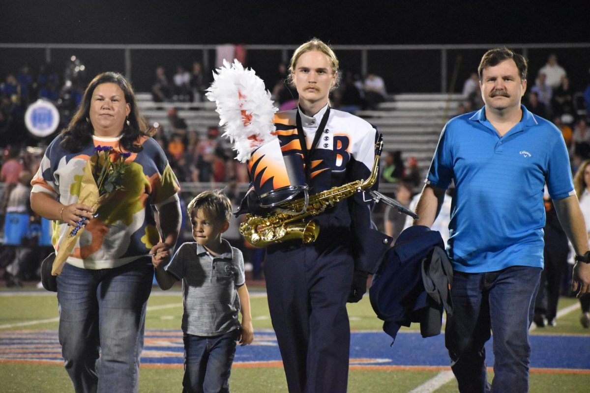 Senior Tristan Andersen with family 