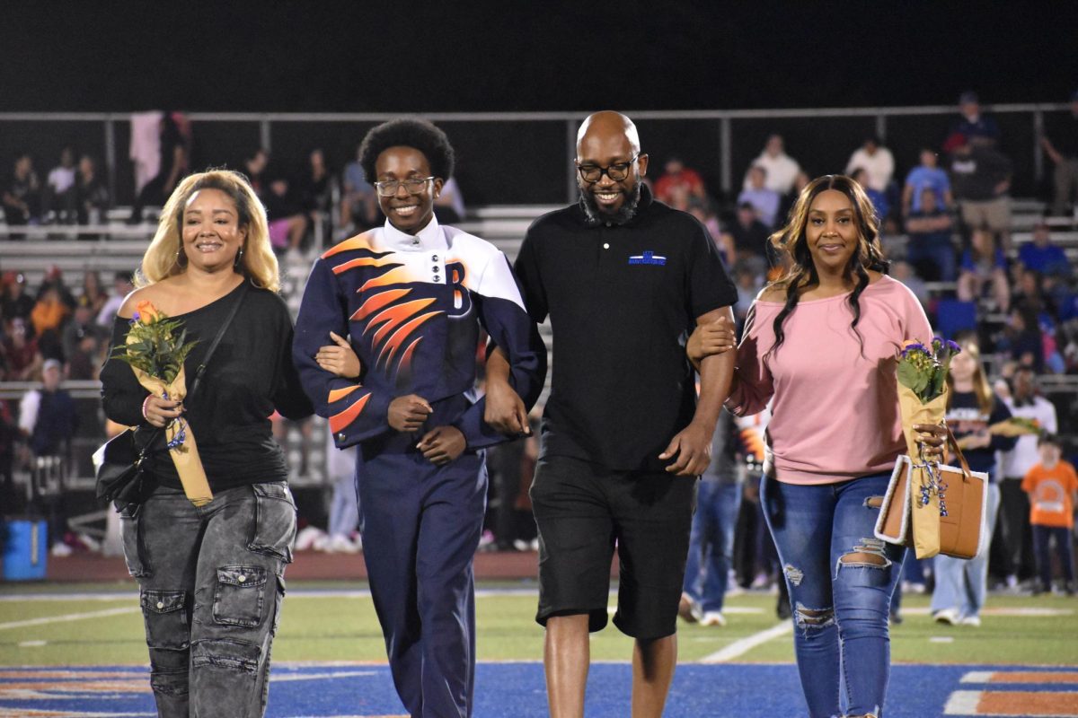 Senior James Bush with family 