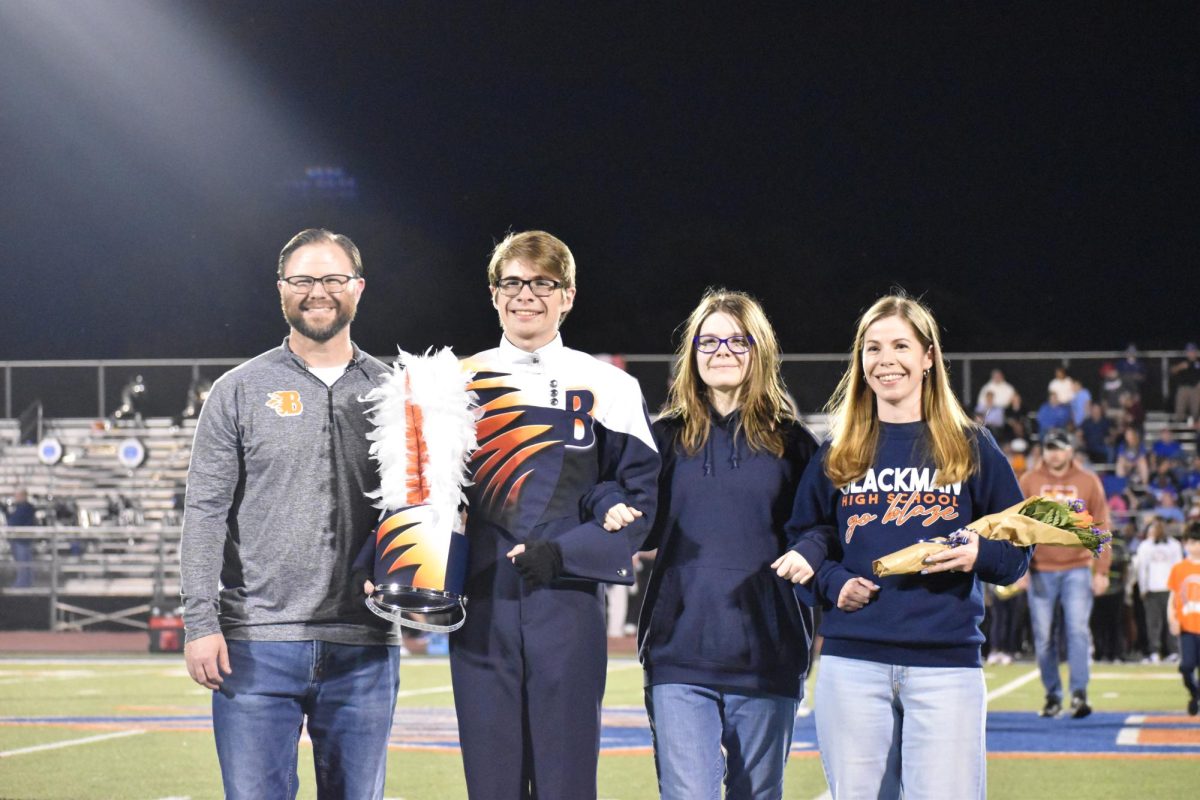 Senior Jason Capouch with family 