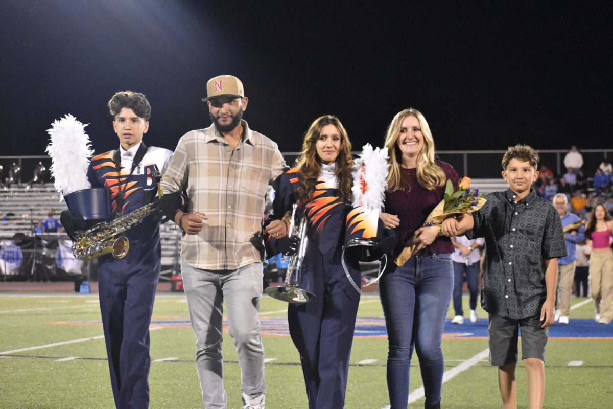 Senior Noelle Trinidad with family 