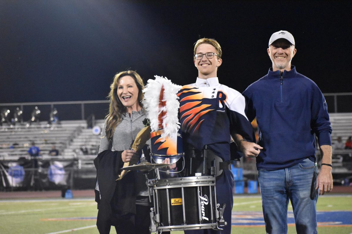 Senior Everett Whittington with family 