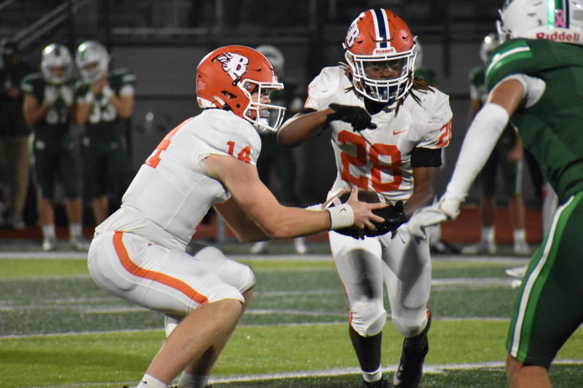 Johnathan Hamby handing it off to Jabari Kemp