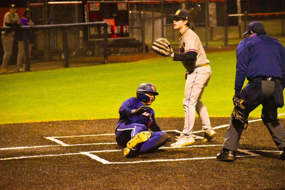 Austen Leban sliding into home 