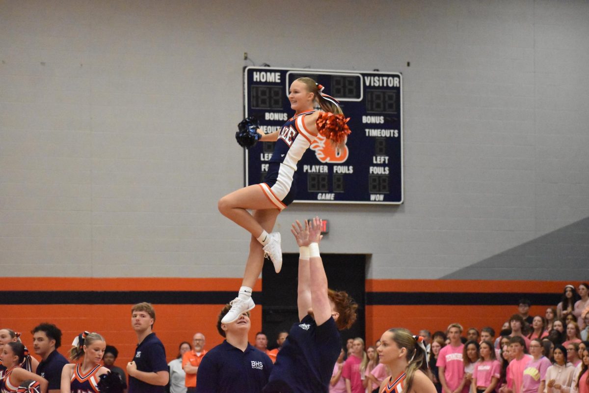 Cheerleader in the air