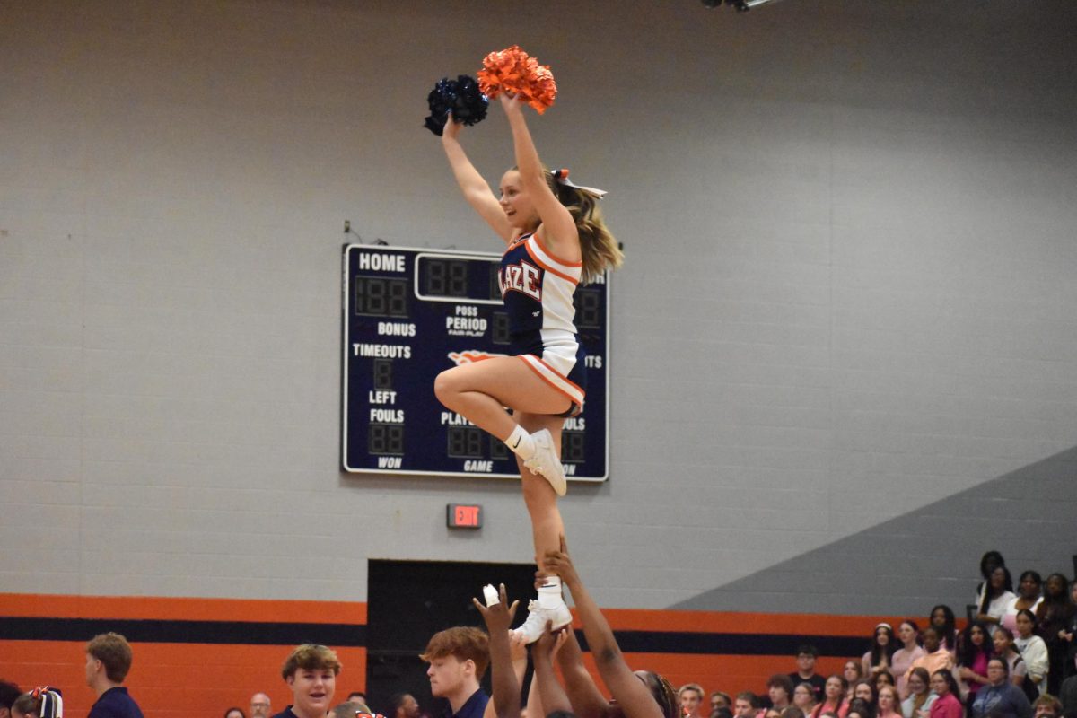 Cheerleader in the air