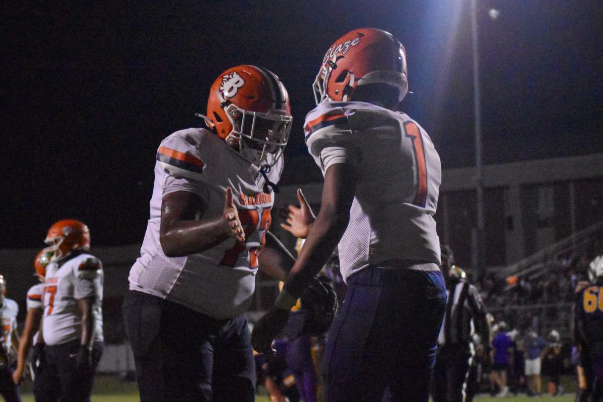 Seniors Kennedy Jackson and Jaevion Elliot celebrating a touchdown