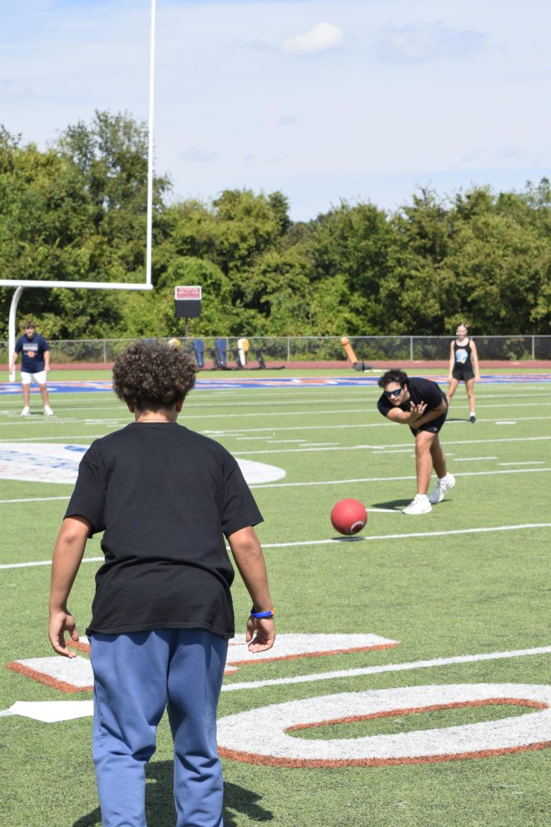 Dominick Ferreira playing as the pitcher in Blaze Bash kickball.