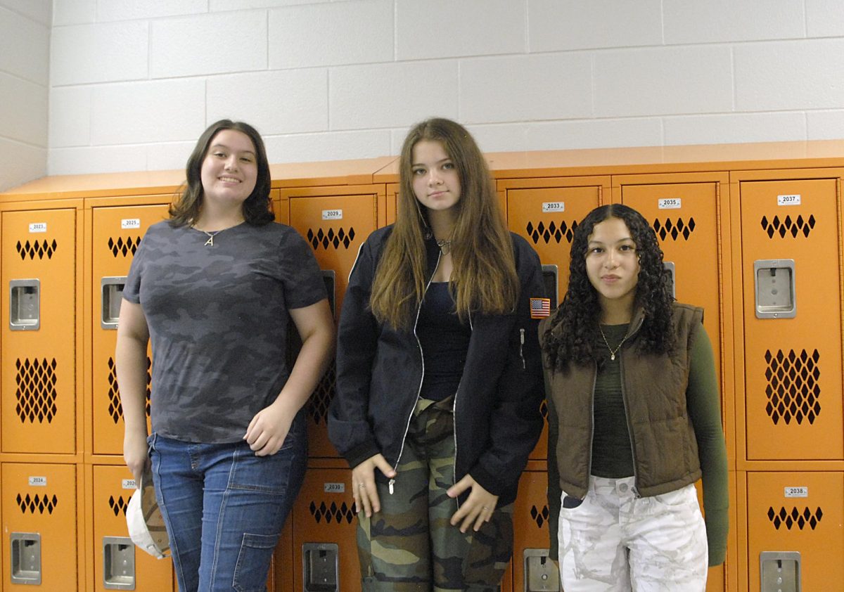 A group of students participating in camo dress up day at school