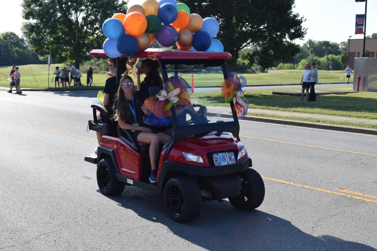 Golf cart with balloons