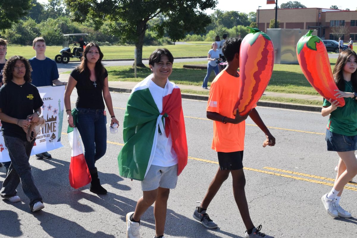 Man with Mexico flag cape