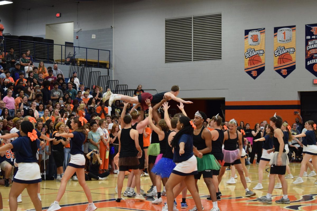 Man being held up in prep rally
