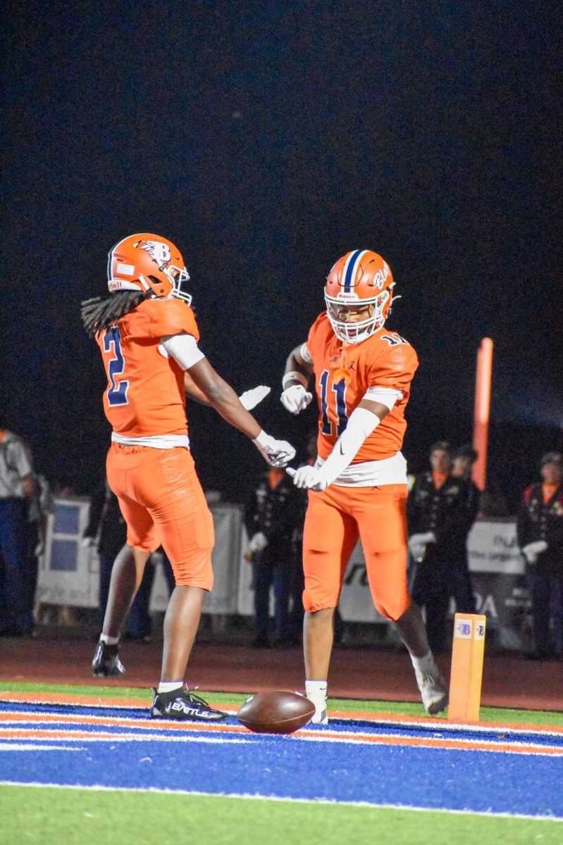 Micah Nance and Brycen Mitchell celebrating a touchdown 