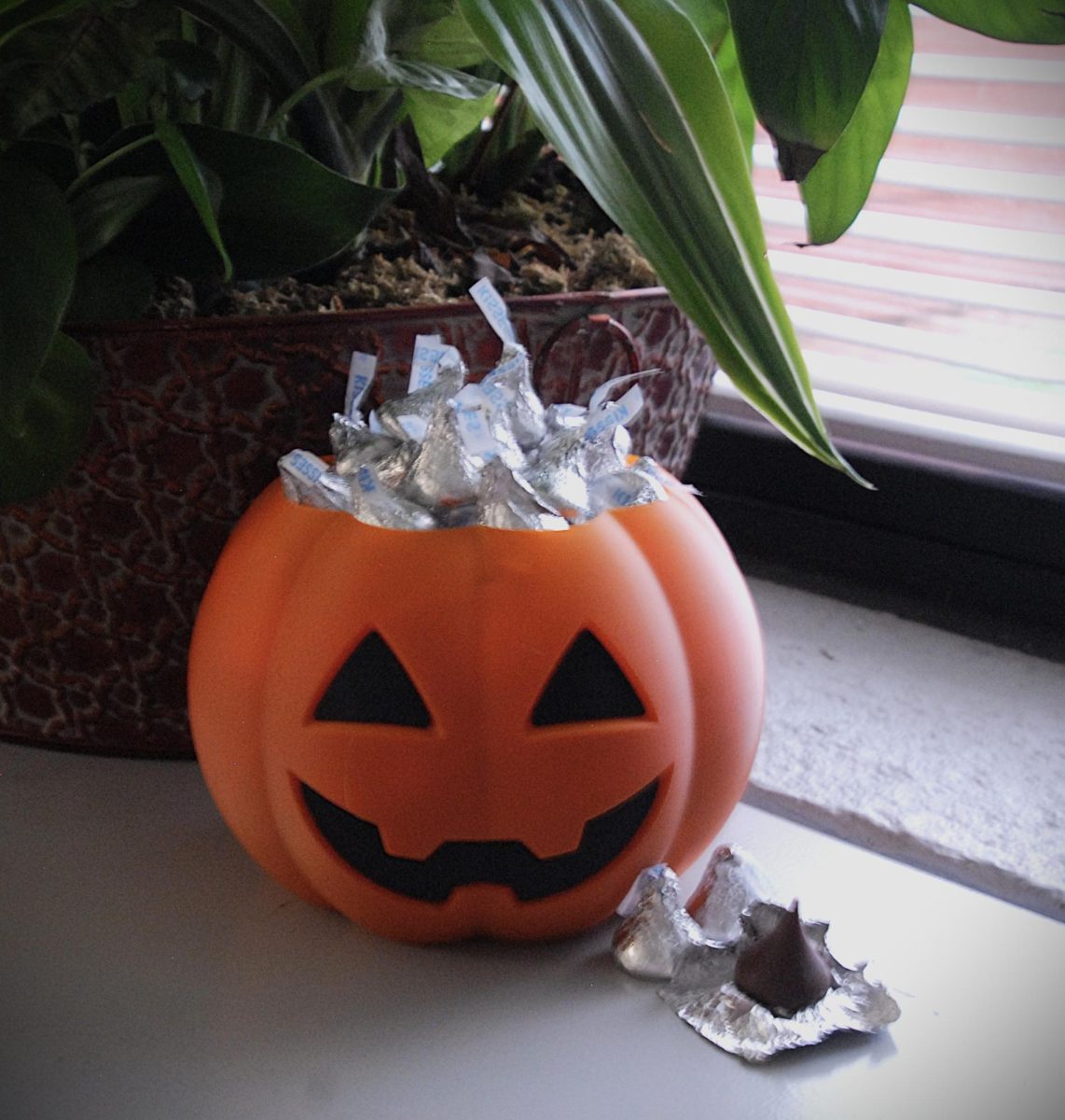 A cute pumpkin filled with tasty chocolate