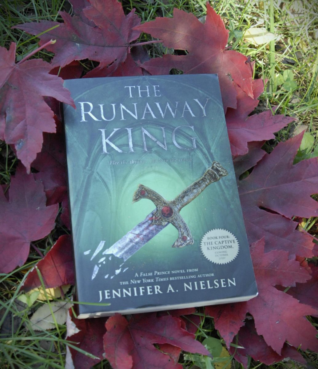 A book titled  "The Runaway King" by Jennifer A. Nielsen 